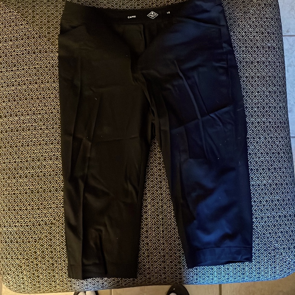 Five pair of black St John’s Bay size 12 capris, with tags